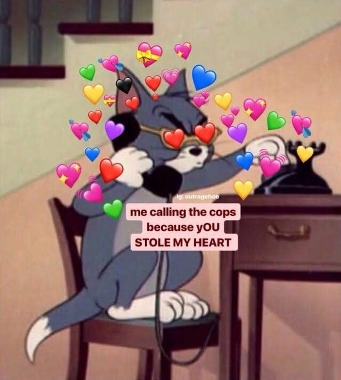 Meme mèo Tom cười nham hiểm